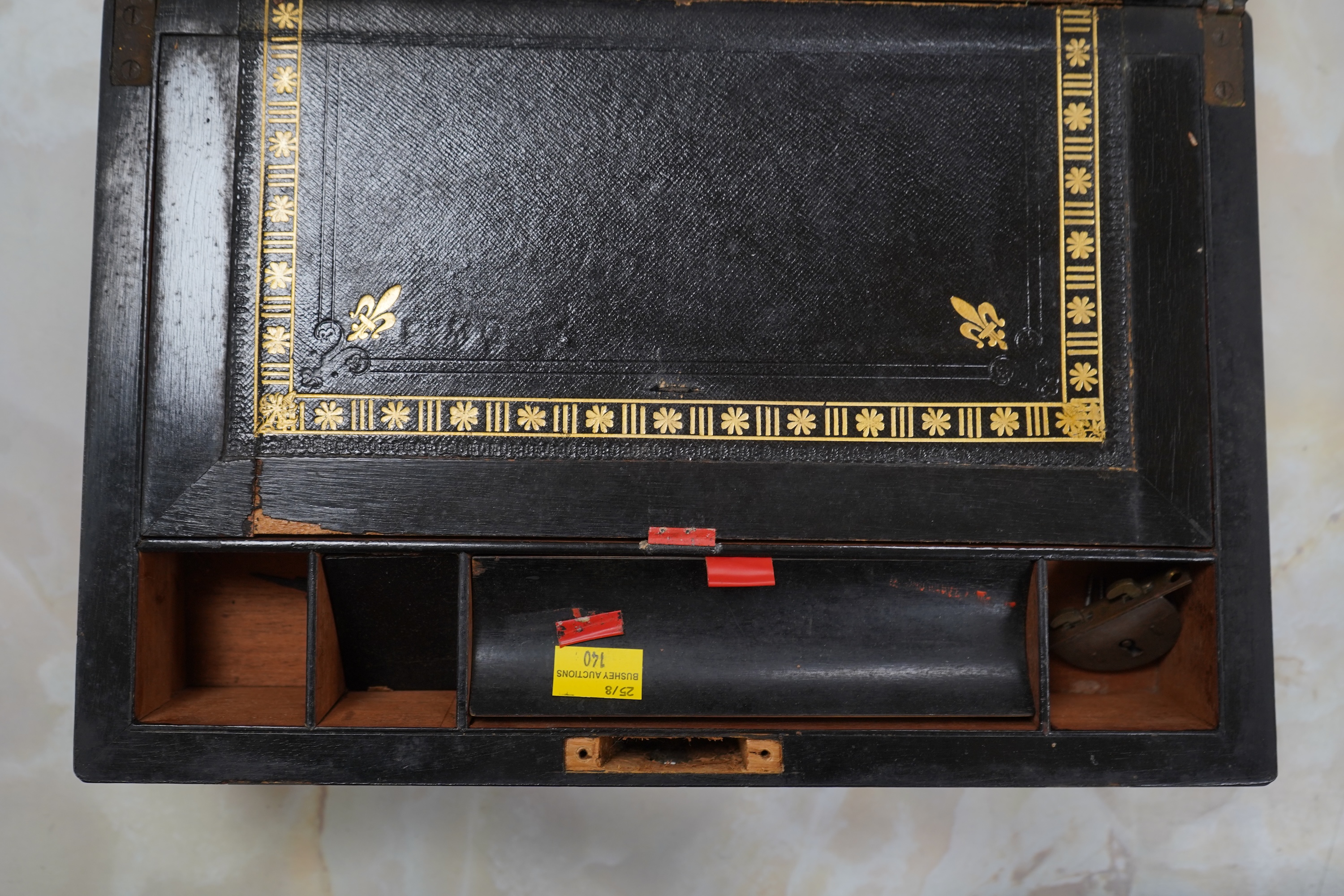 A brass bound walnut writing box with tooled leather slope, 35cm wide